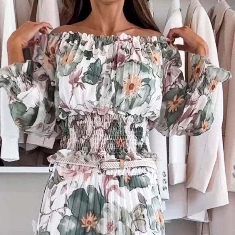 Conjunto de dos piezas con estampado floral y blusa descubierta con falda larga