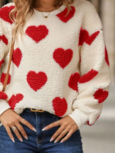 SUÉTER CON MOTIVO DE CORAZONES – DULZURA Y ESTILO