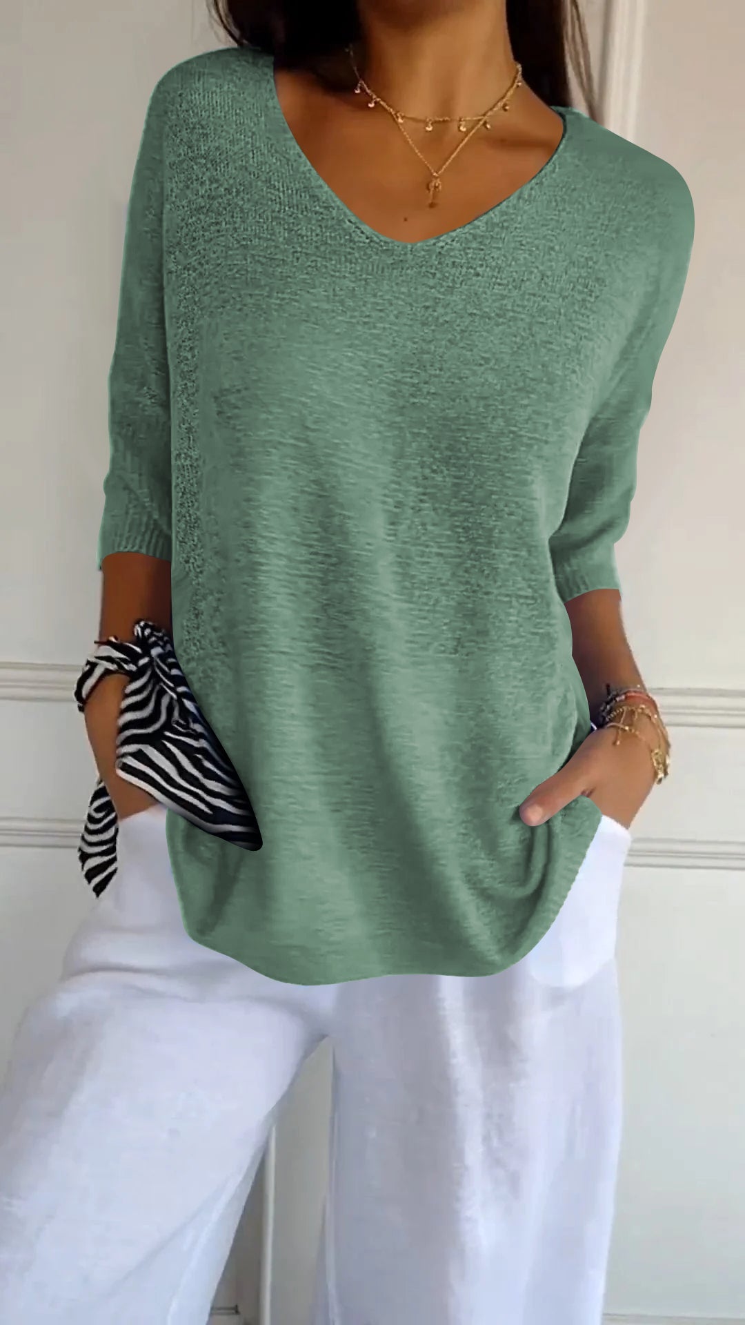 Top da donna in maglia con scollo a V, semplice e aderente