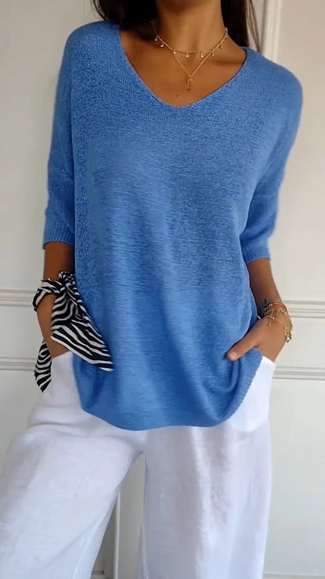 Top da donna in maglia con scollo a V, semplice e aderente