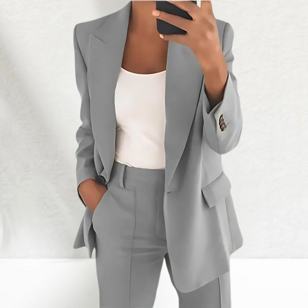 CONJUNTO ELEGANTE DE MUJER CON AMERICANA ESTRUCTURADA Y PANTALÓN AMPLIO