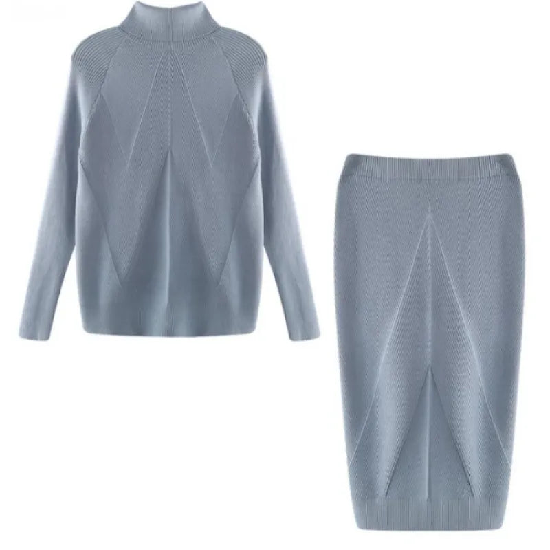 CONJUNTO ELEGANTE CON SUÉTER Y FALDA HASTA LA RODILLA