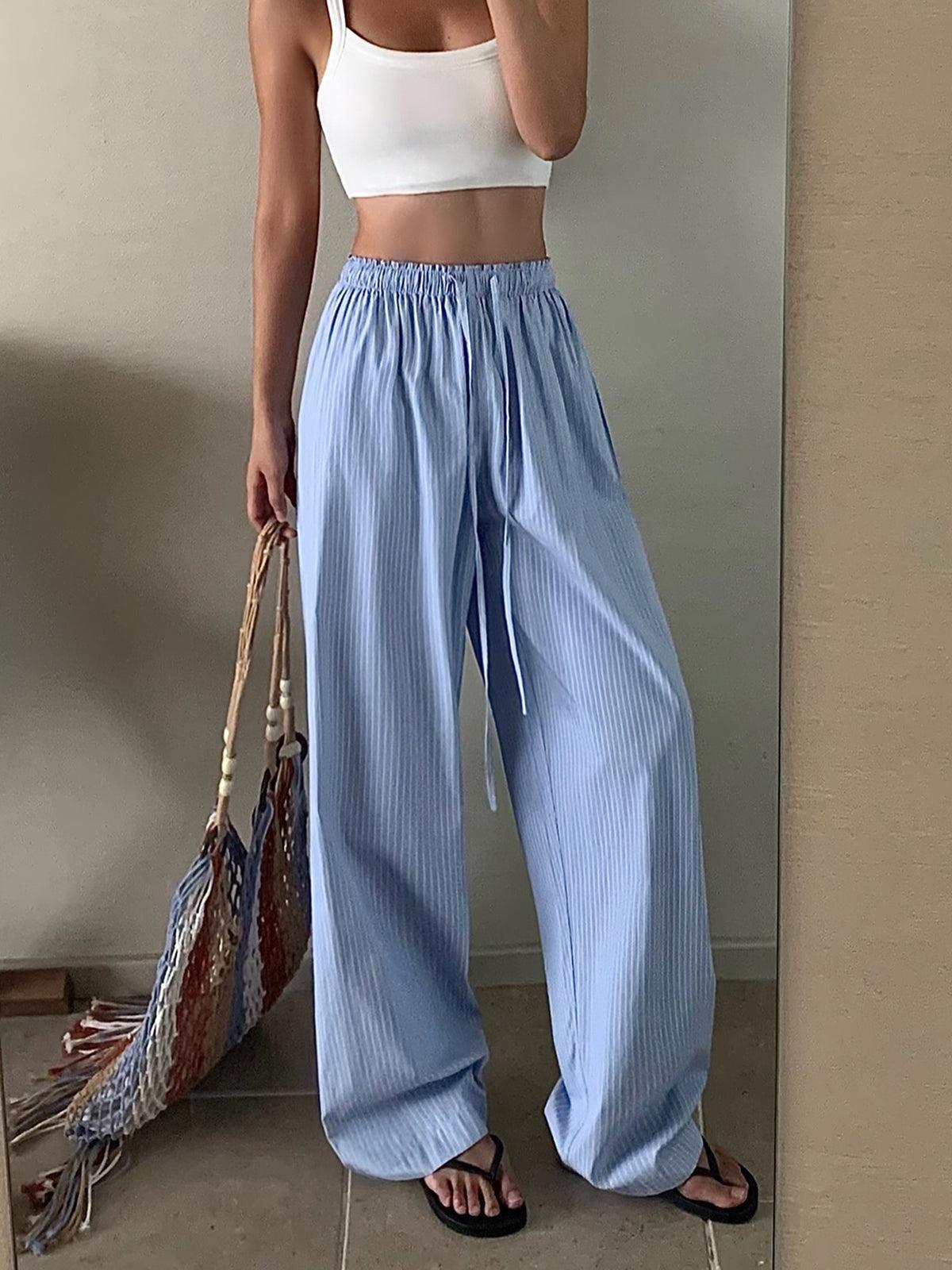 PANTALONES PALAZZO DE RAYAS CON CINTURA ELÁSTICA Y CORDÓN