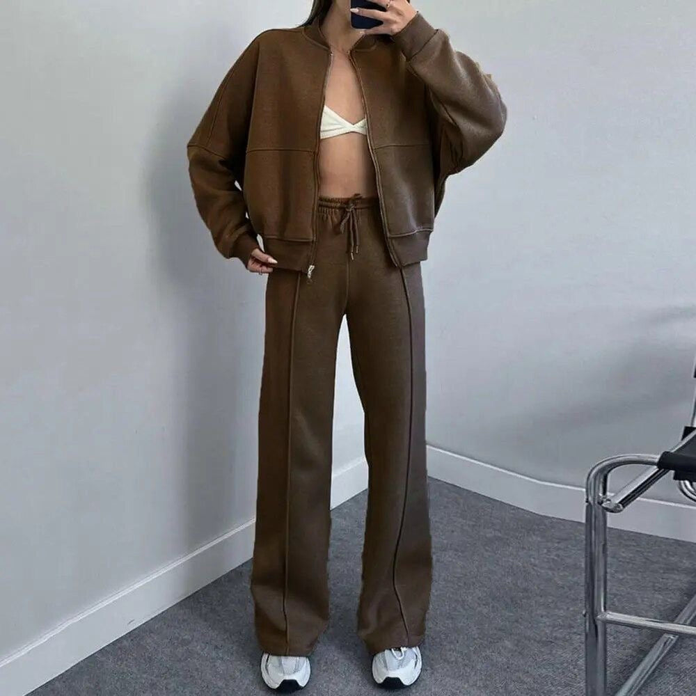 CONJUNTO DEPORTIVO CASUAL MUJER CON CHAQUETA CREMALLERA Y PANTALÓN ACAMPANADO