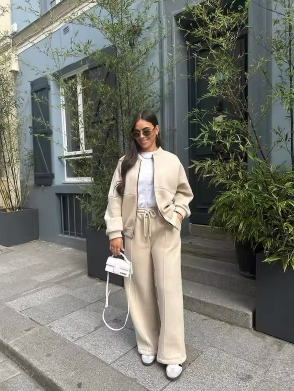 CONJUNTO DEPORTIVO CASUAL MUJER CON CHAQUETA CREMALLERA Y PANTALÓN ACAMPANADO