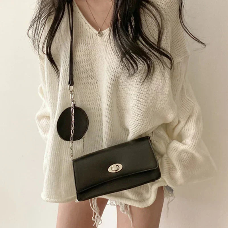 SUÉTER AMPLIO CON ESCOTE EN V – COMODIDAD Y ESTILO EN UN SOLO LOOK