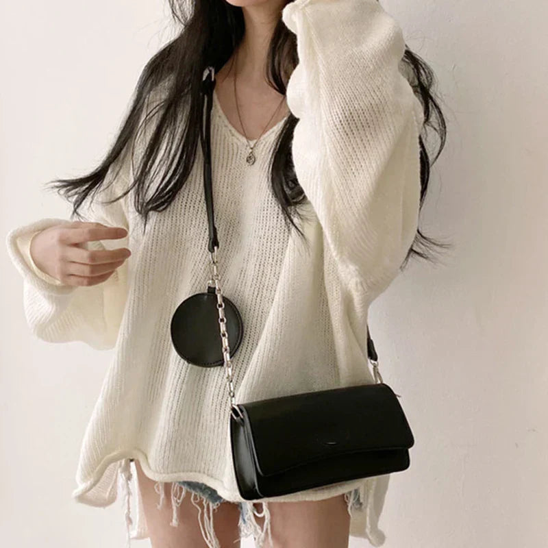 SUÉTER AMPLIO CON ESCOTE EN V – COMODIDAD Y ESTILO EN UN SOLO LOOK