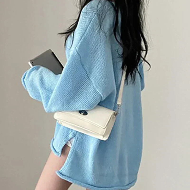 SUÉTER AMPLIO CON ESCOTE EN V – COMODIDAD Y ESTILO EN UN SOLO LOOK