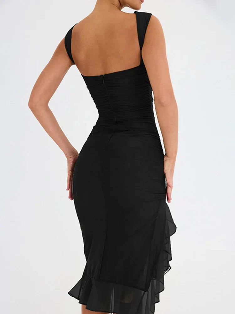 NOA VESTIDO MIDI CON VOLANTES