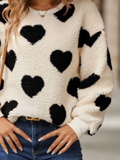 SUÉTER CON MOTIVO DE CORAZONES – DULZURA Y ESTILO