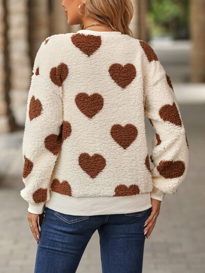 SUÉTER CON MOTIVO DE CORAZONES – DULZURA Y ESTILO