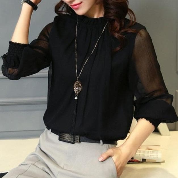 BLUSA CON VOLANTES Y MANGAS TRANSPARENTES – FEMINIDAD Y ESTILO