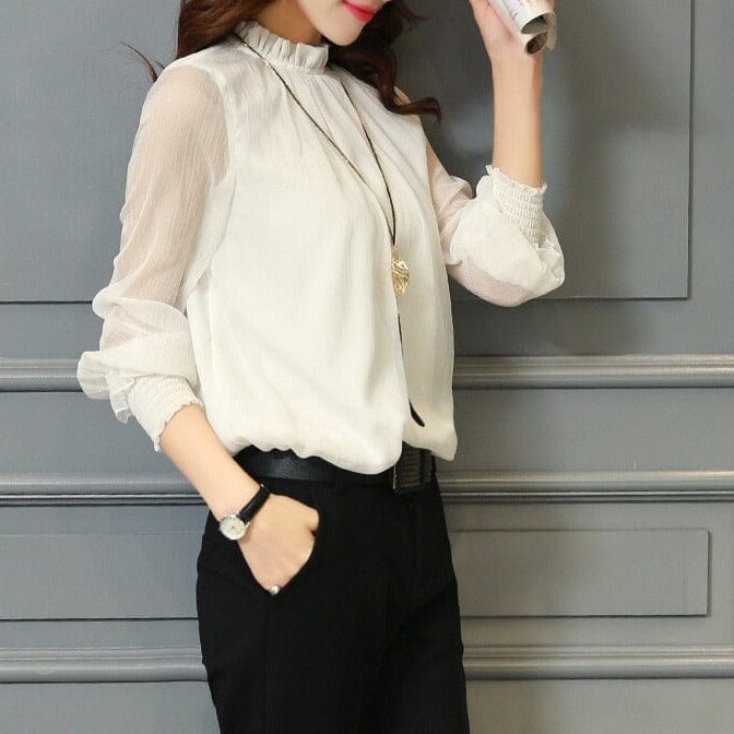 BLUSA CON VOLANTES Y MANGAS TRANSPARENTES – FEMINIDAD Y ESTILO