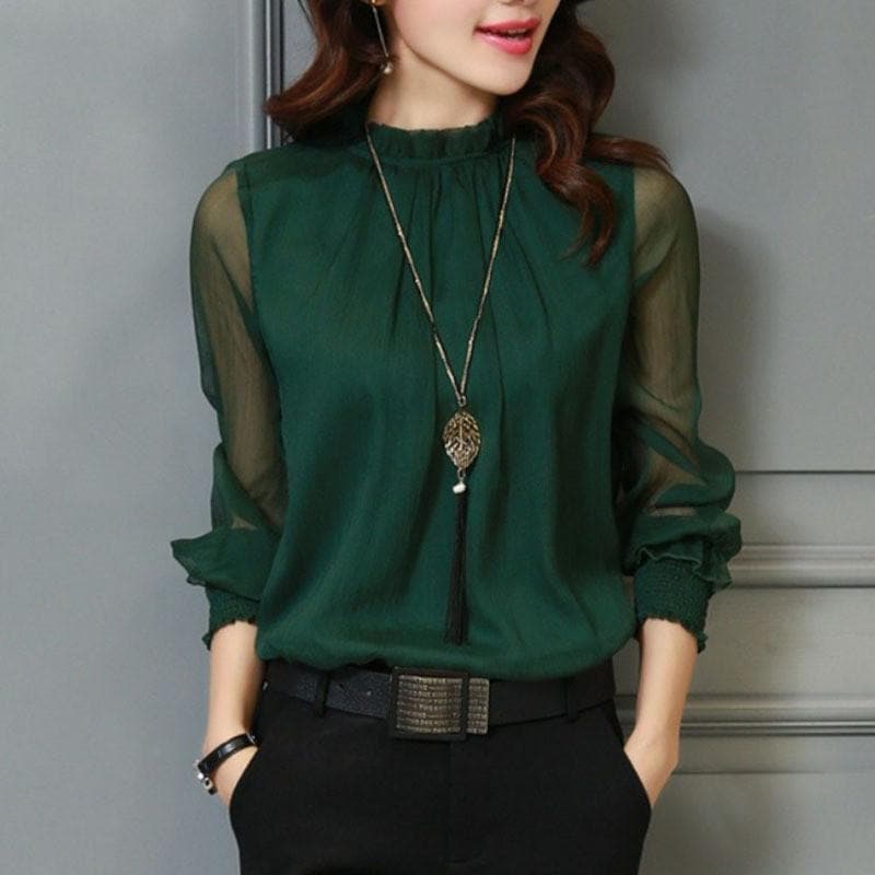 BLUSA CON VOLANTES Y MANGAS TRANSPARENTES – FEMINIDAD Y ESTILO