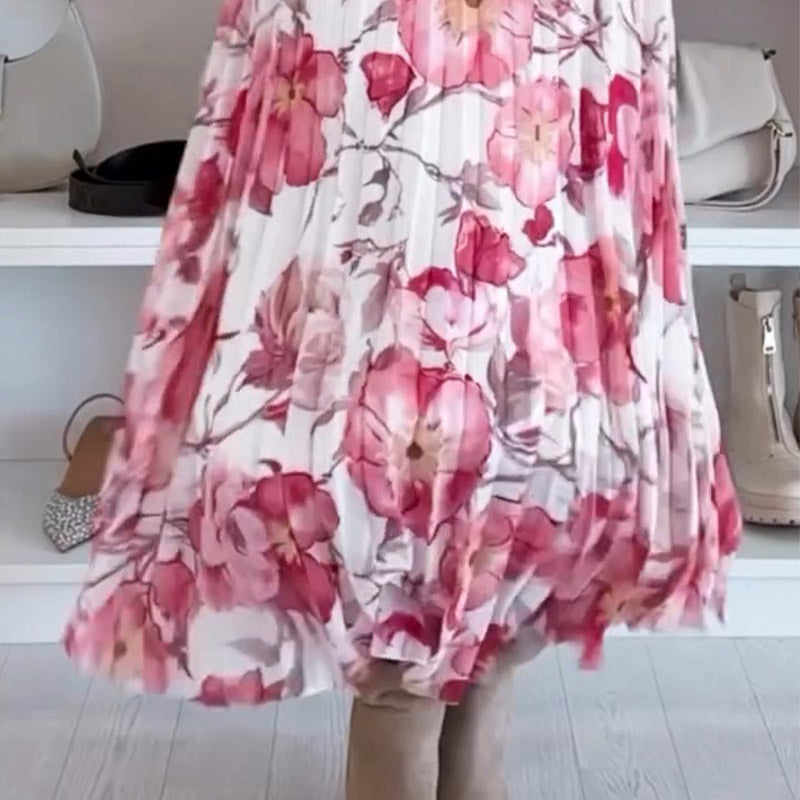 Conjunto de dos piezas con estampado floral y blusa descubierta con falda larga