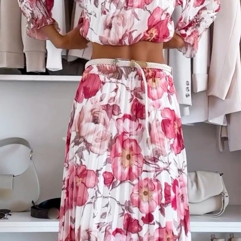 Conjunto de dos piezas con estampado floral y blusa descubierta con falda larga