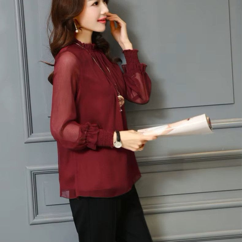 BLUSA CON VOLANTES Y MANGAS TRANSPARENTES – FEMINIDAD Y ESTILO